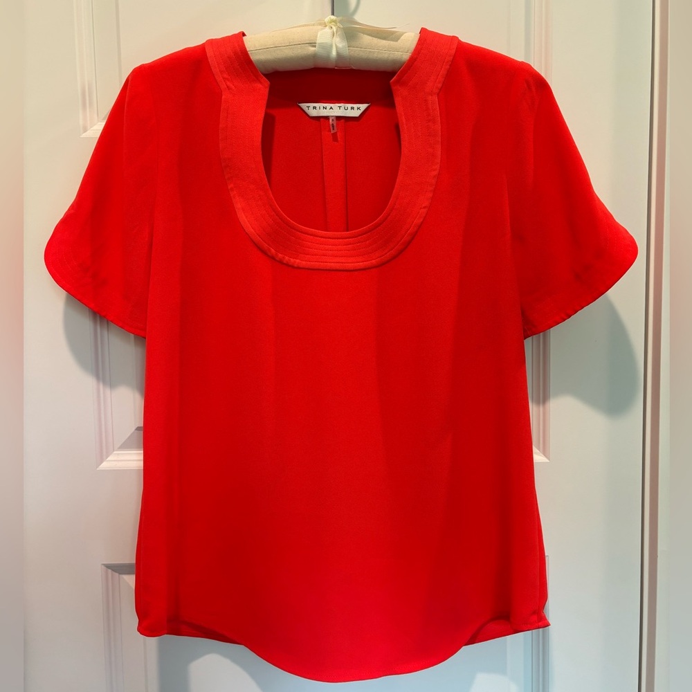 Trina Turk orange keyhole neck shirt